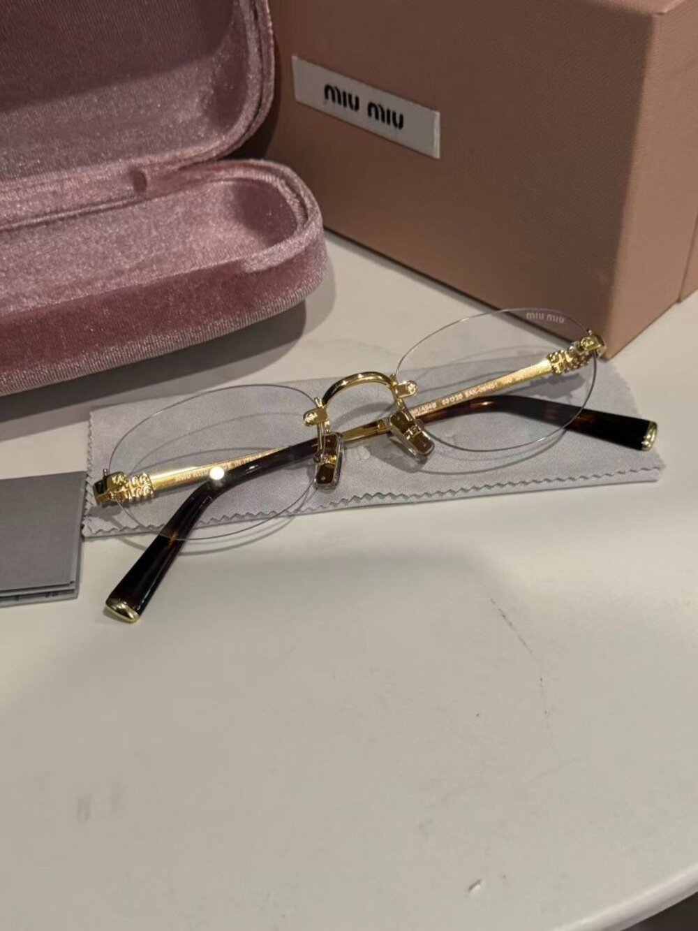 Miu Miu glasses